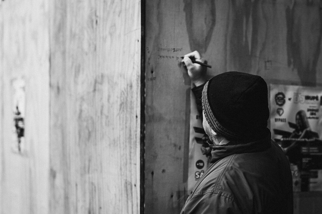 Facilitator writing on a whiteboard during a corporate workshop