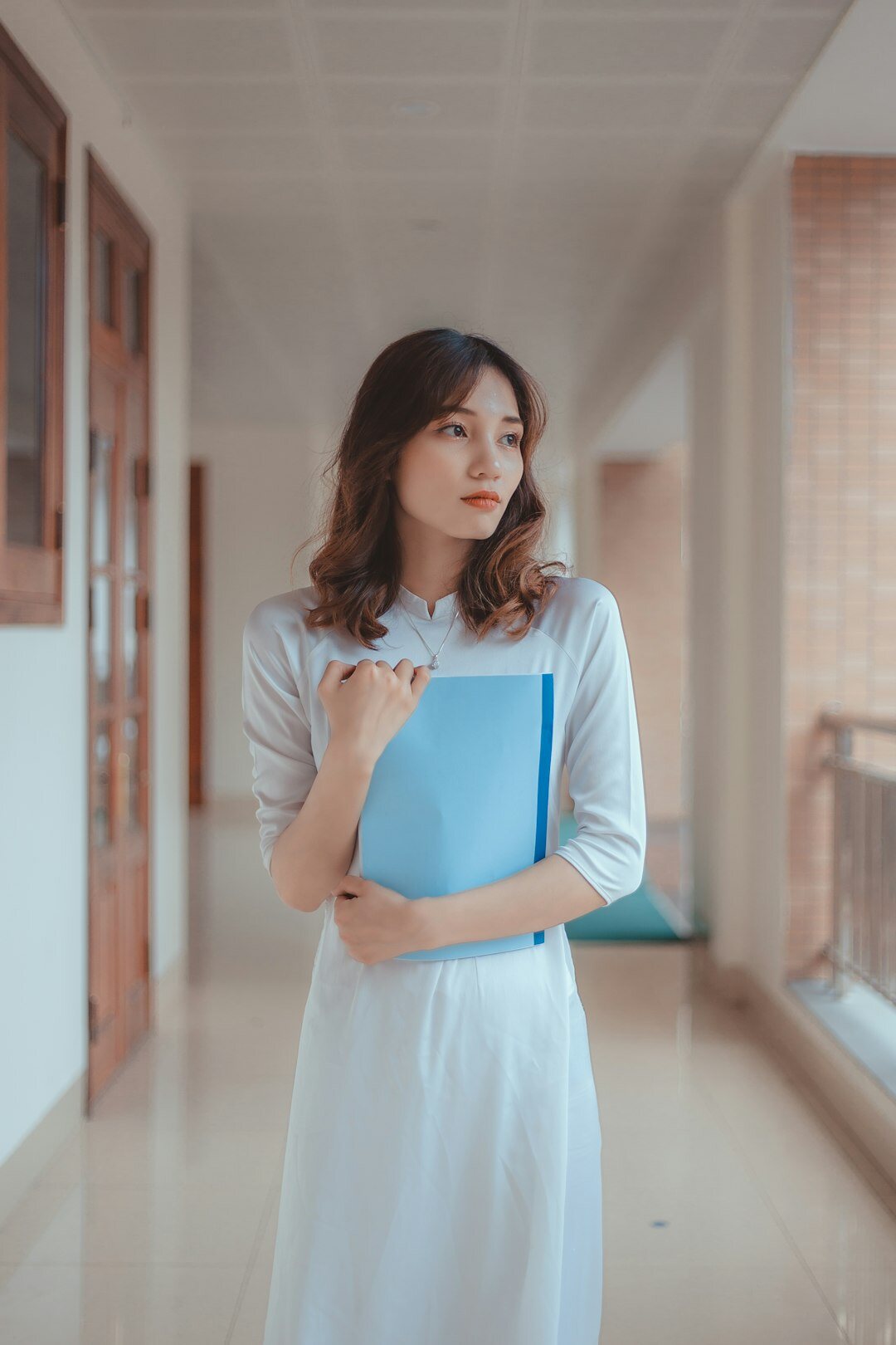 Portrait of a professional facilitator holding a notebook