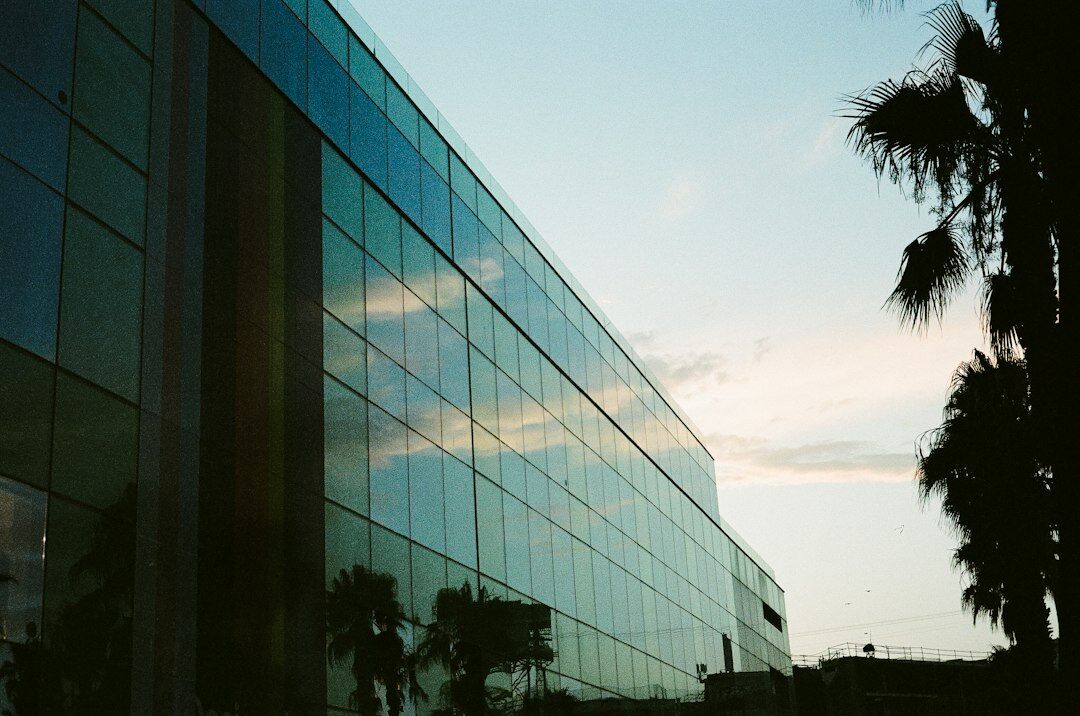 Modern glass office building exterior in a European city